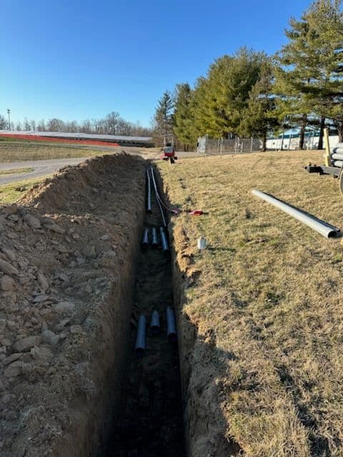 Underground Conduit Installation at Construction Site image